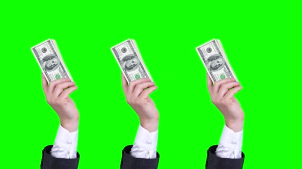 De l'argent, du liquide. Animation Gif. Gros plan. mains masculines, en costume d'affaires, tenir des paquets de billets de cent dollars, les agiter. isolé sur fond vert. boucle motif sans couture. animation — Video