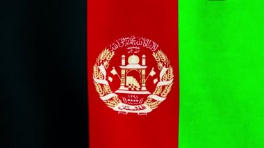 Afganistan bayrağı. Afgan bayrağı rüzgarda sallanıyor. Afganistan Ulusal Bayrağı. 3 boyutlu kusursuz döngü animasyonu. Yüksek kalite 4k görüntü