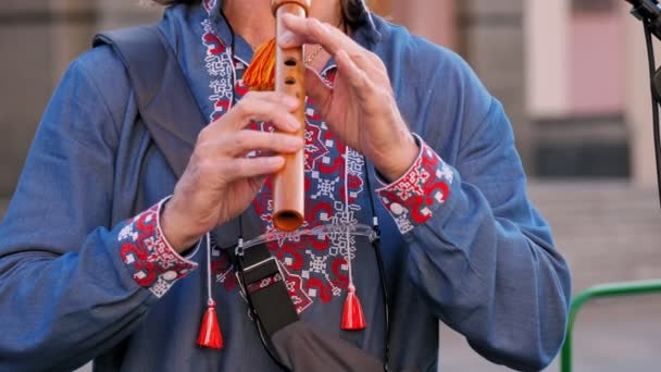 Wooden Flute Close Embroidered Shirt Street Musician Embroidered Shirt Plays — Stock Video