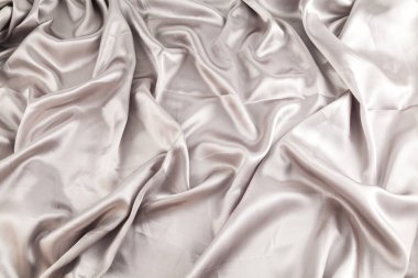 Arkaplan ve doku; dalgalı saten kumaş.