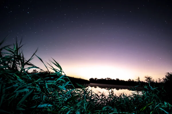 Noche sobre el lago Imagen de stock