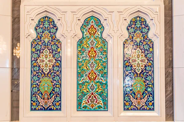 Middle East, Arabian Peninsula, Oman, Muscat. Decorative windows in the Sultan Qaboos Grand Mosque in Muscat.