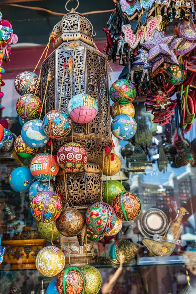 Middle East, Arabian Peninsula, Oman, Muscat, Muttrah. Oct. 21, 2019. Decorative souvenirs for sale at the souk in Muttrah.