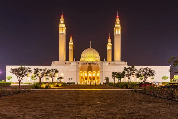 Middle East, Arabian Peninsula, Oman, Ad Dakhiliyah, Nizwa. Night view of the Sultan Qaboos Grand Mosque.