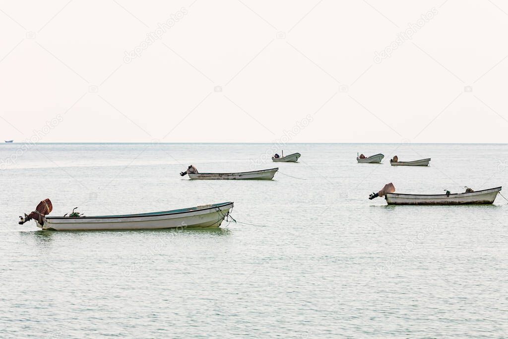 Middle East, Arabian Peninsula, Oman, Al Wusta, Mahout. Fishing boats on the Arabian Sea in Oman.