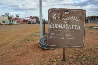 Welcome to Oodnadatta sign in the outback of South Australia clipart