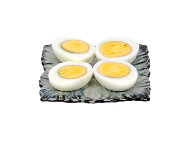 Boiled eggs on ceramic plate — Stock Photo, Image