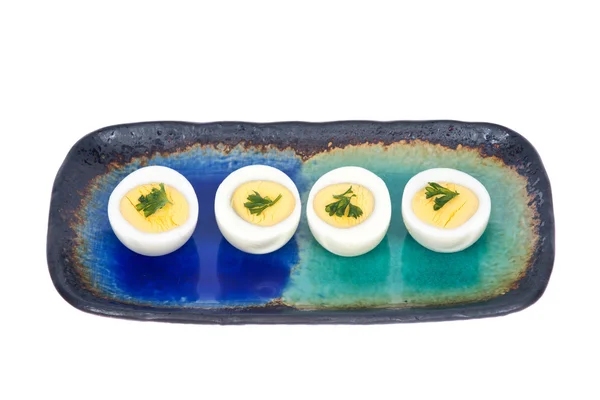 Huevos cocidos con perejil en plato — Foto de Stock