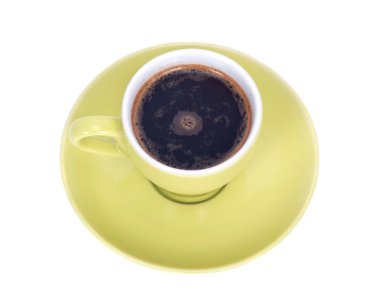 Uçan daire üzerinde yeşil fincan sade kahve