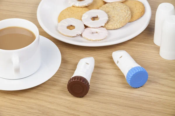 Two asthma powder inhalers laying on the breakfast table — Stock Photo, Image