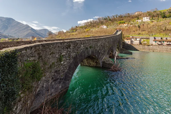 Il vecchio ponte conosciuto come Ponte della Maddalena, Toscana, Italia Immagini Stock Royalty Free