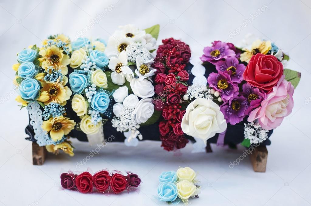 Hoop from flowers, wreath with colored flowers. Handmade flowers