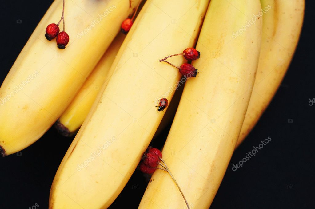 Bunch of bananas on black background. Fresh organic Banana. Stock Photo by  ©ch_ch 101510678