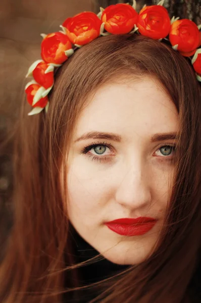 Beautiful young girl with long straight hair, light make-up in a — Stock Photo, Image