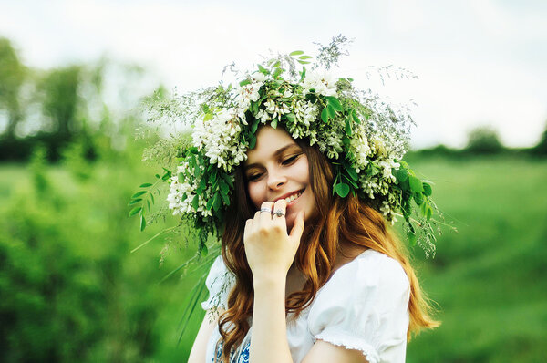 Young pagan Slavic girl conduct ceremony on Midsummer. Beauti gi