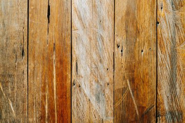 Rustic weathered wooden planks texture with natural grain and vintage tones. Ideal for textured backgrounds, organic design elements, and abstract wallpaper for creative projects.