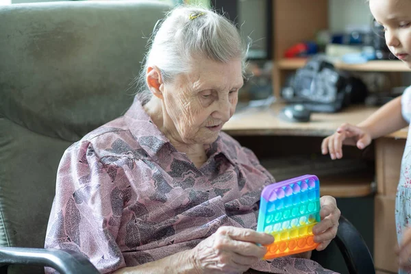 Grandmother Playing Modern Stress Pop Old Woman Resting Armchair — Stock Photo, Image