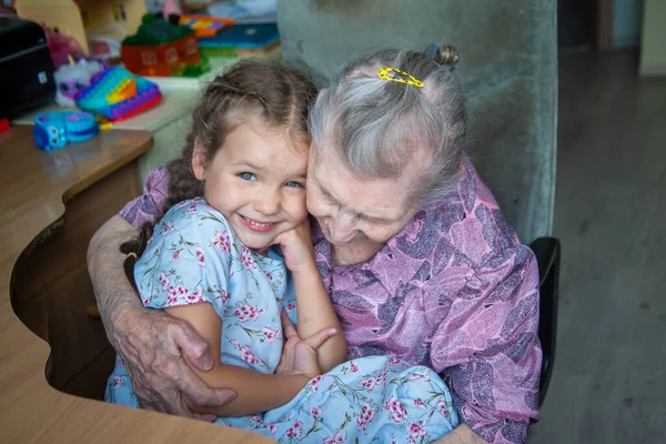 Portrait Old Woman Little Girl Grandmother Hugs Her Granddaughter Family — Stock Photo, Image