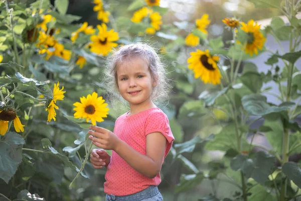 Little Happy Girl Pink Shirt Sunflowers Bright Yellow Flowers Field — Stock Photo, Image