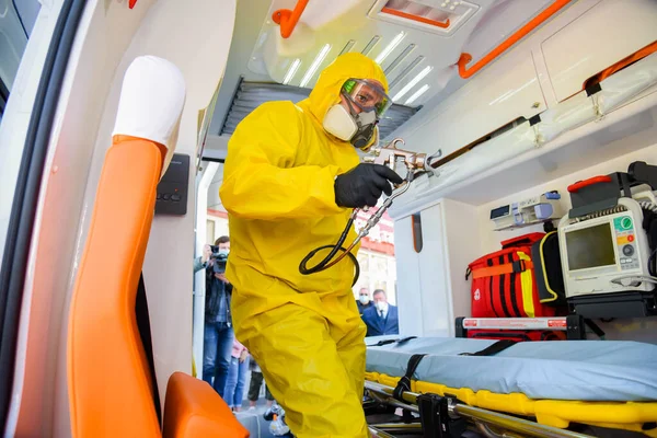 Poltava Ukraine April 2021 Doctor Protective Suit Disinfects Ambulance Coronavirus — Stock Photo, Image