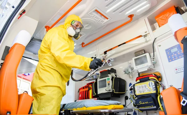 Poltava Ukraine April 2021 Doctor Protective Suit Disinfects Ambulance Coronavirus — Stock Photo, Image