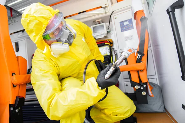 Poltava Ukraine April 2021 Doctor Protective Suit Disinfects Ambulance Coronavirus — Stock Photo, Image