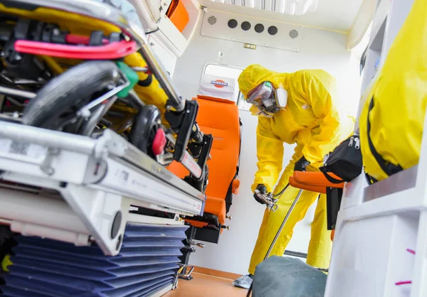 Poltava Ukraine April 2021 Doctor Protective Suit Disinfects Ambulance Coronavirus — Stock Photo, Image