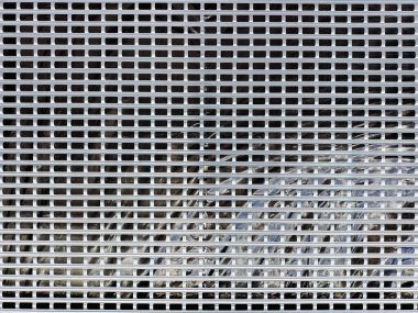 Lifting gates. Grid texture with rectangular cells. Close-up.