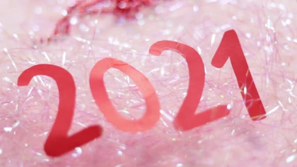 Inscription 2021 Tinsel Numbers 2021 Red Paper Pink Background New — Stock Video