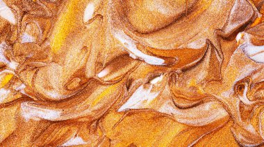 Soyut ışıldayan metalik doku. Bronz turuncu arka plan ve parlak lekeler. Altın ışıltılı fırça darbeleri. Şenlikli arkaplan