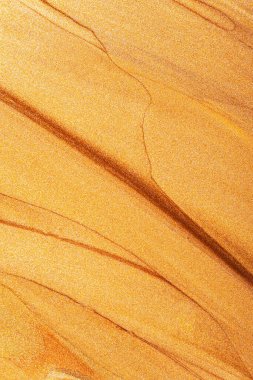 Soyut ışıldayan metalik doku. Bronz turuncu arka plan ve parlak lekeler. Altın ışıltılı fırça darbeleri. Şenlikli arkaplan