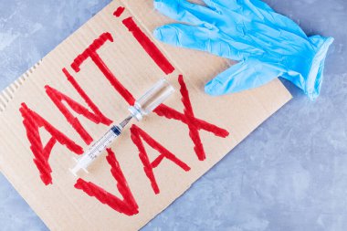 'Anti vax' protez levhası. Aşı kavramını durdur. Coronavirus Anti Vax tartışma konsepti