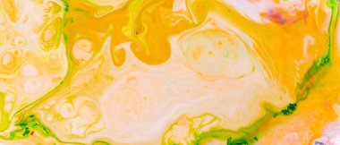 Sıvı Sanat. Soyut bulanık arkaplan rengi. Hint desenli canlı sarı asit, turuncu ve yeşil