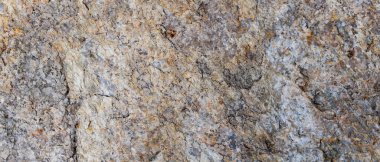 Granit taş yüzey dokusu. Kabataslak granit yüzey arka planının dokusu. Doğal malzemeden soyut arkaplan