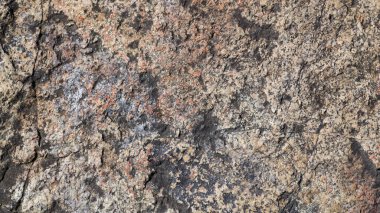 Granit taş yüzey dokusu. Kabataslak granit yüzey arka planının dokusu. Doğal malzemeden soyut arkaplan