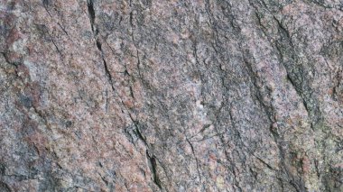 Granit taş yüzey dokusu. Kabataslak granit yüzey arka planının dokusu. Doğal malzemeden soyut arkaplan