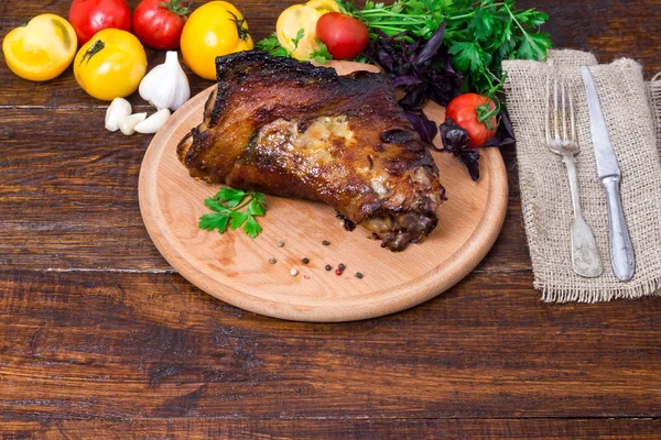 Shin, knee wild boar - roast pork leg with vegetables — Stock Photo, Image
