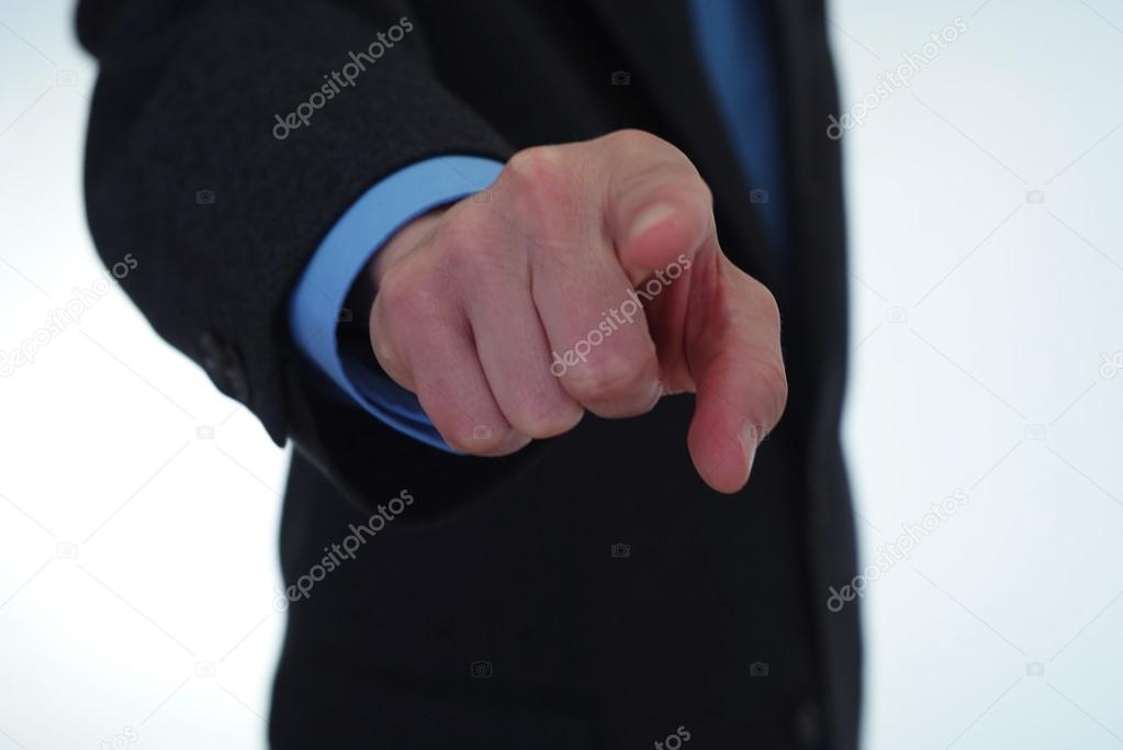 Businessman pointing finger at you