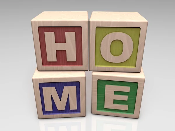 HOME written with wooden blocks — Stock Photo, Image