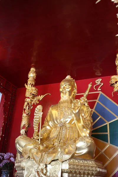 Altın Çin Aziz heykeli. — Stok fotoğraf