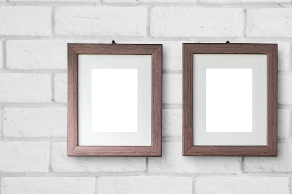 Beautiful two wooden picture frame hanging on white brick wall for couple lover photos minimal simple modern style