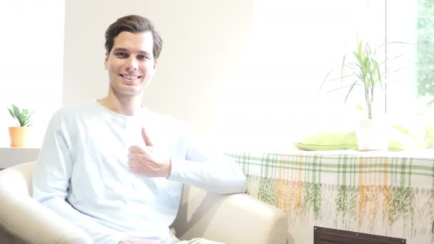 Portrait of handsome young man  thumbs up smiling at camera  , work place — Stock Video