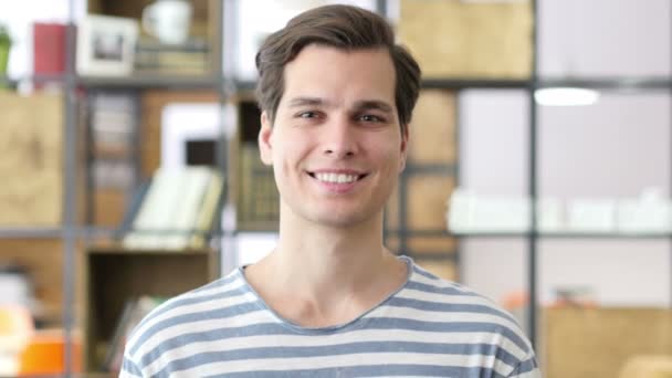 Happy male student , designer ,  smiling indoors — Stock Video