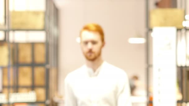 Man Walking Toward Camera in Office, Smiling Gesture — Stock Video