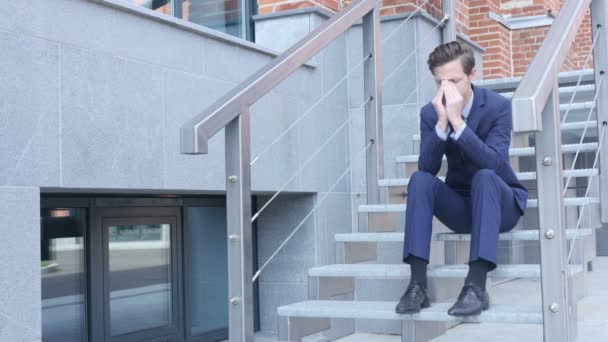 Tired Frustrated Young Businessman Sitting on Stairs Outside Office — Stock Video