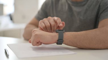 Young Man Using Smartwatch, Close Up