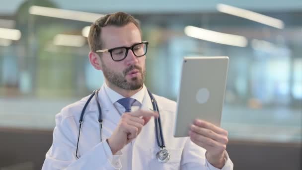 Portrait of Video Call on Tablet by Young Male Doctor — Stock Video