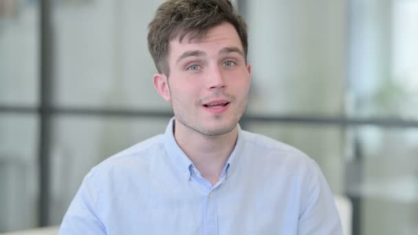 Young Man Pointing at the Camera — Stock Video