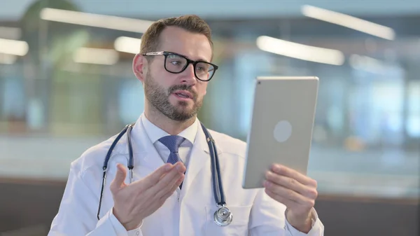 Video Chat on Tablet by Young Male Doctor — Stock Photo, Image