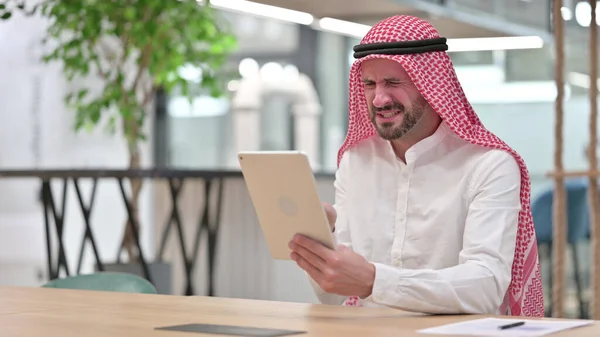 Disappointed Arab Businessman having Loss on Tablet — Stock Photo, Image